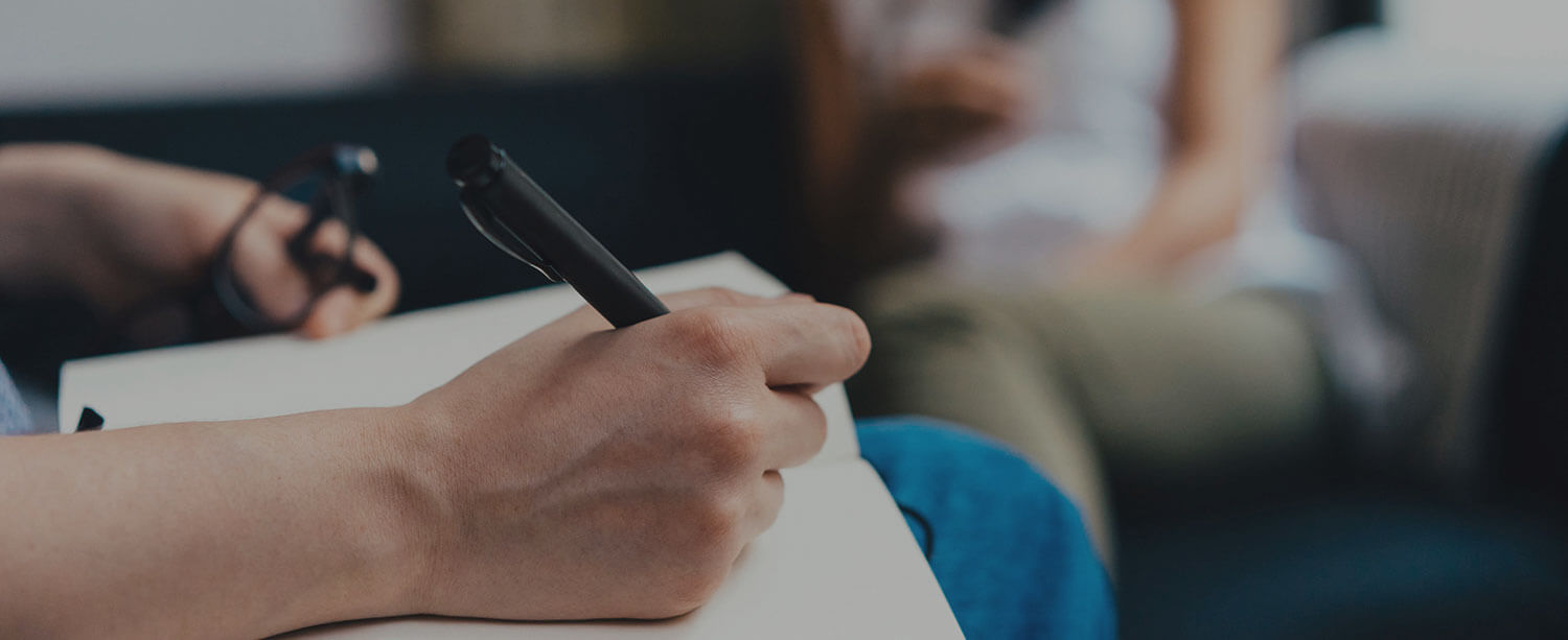 Therapist Writes While Client Listens