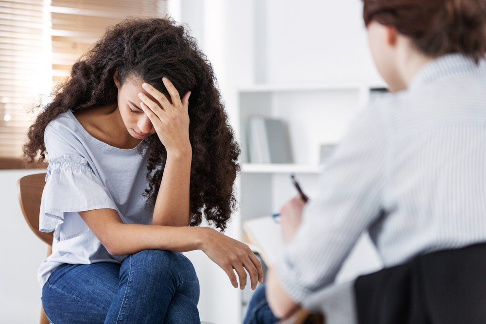 young woman in counselling session