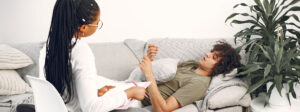 Man speaking to therapist in LGBTQ+ counselling session