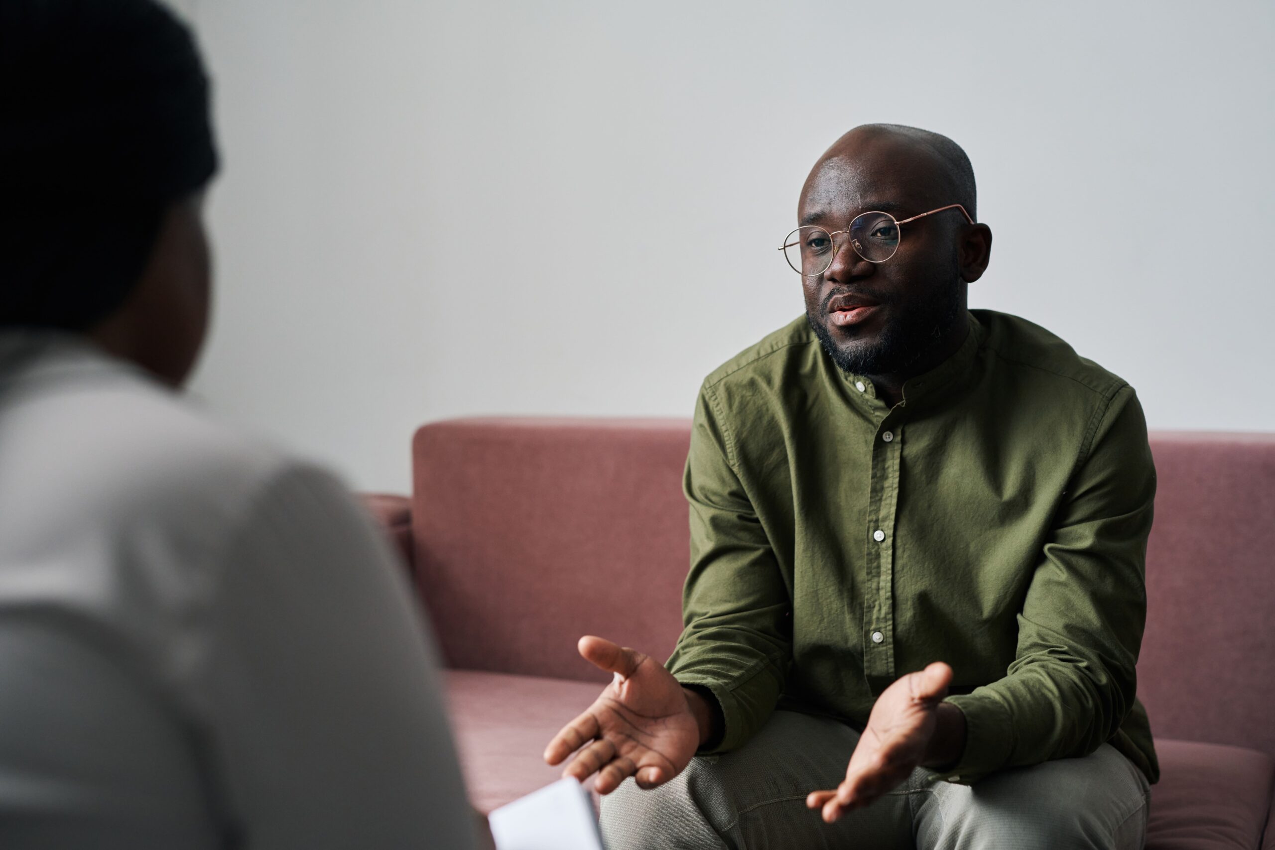 man speaking to therapist during therapy in Newcastle